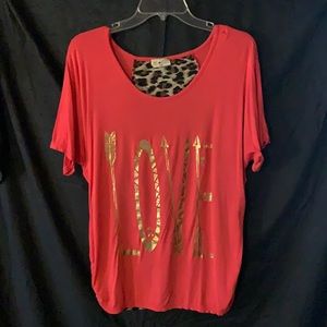 Free Kisses-peach colored top, gold print, animal pattern